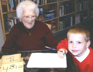Sister Alberta tutors a student
